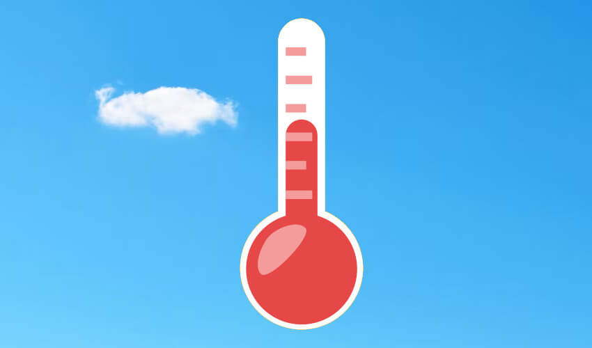 Thermometer with a background of a single cloud in a clear blue sky