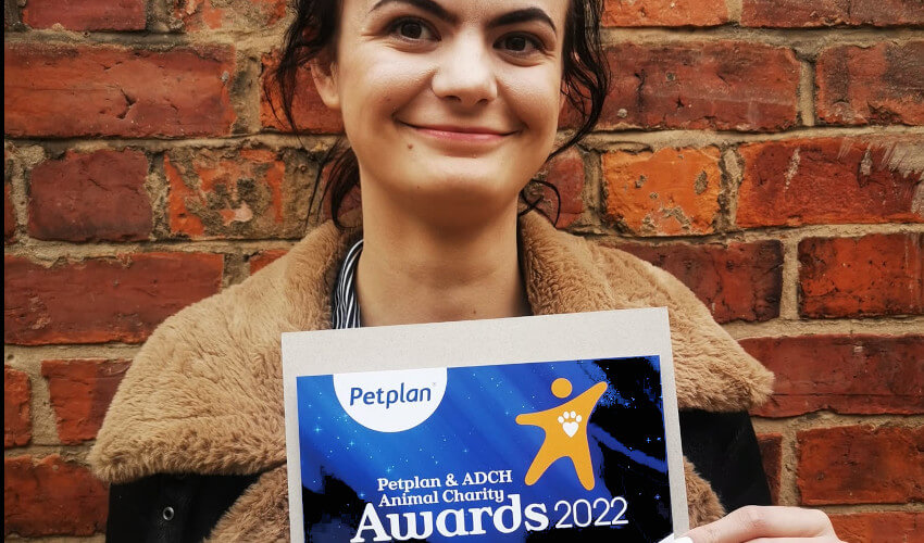 Ellie with certificate